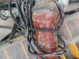 a close up of a car ' s engine with a bunch of wires attached to it