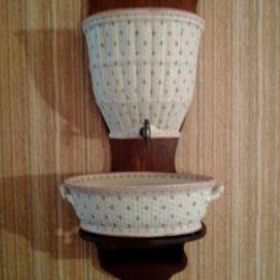 a picture of a wall mounted shelf with two bowls on it
