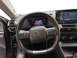 the interior of a car with a steering wheel, dashboard, and dash board