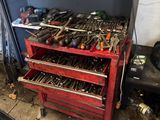 a workbench with a lot of tools on it