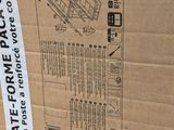 a cardboard box that has a picture of a plane on it
