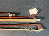 three different types of knitting needles on a table