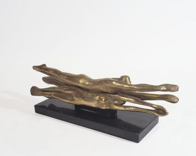 bronze sculpture of two hands holding each other on a black base