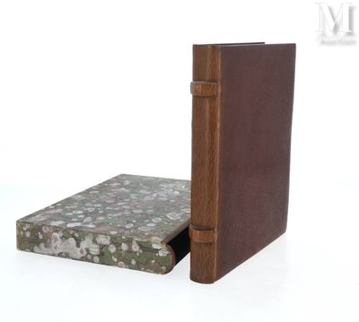 a book that is sitting on a table next to a book