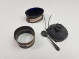 two cups and a spoon sitting on a table