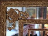 a man taking a picture of himself in a mirror