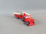 a toy fire truck with a ladder on the back of it