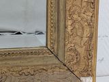 a mirror that is sitting on a table