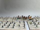 a lot of small figurines that are on a table