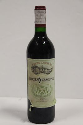 a bottle of wine that is sitting on a table