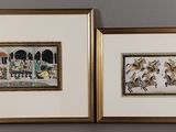 deux tableaux encadrés accrochés au mur