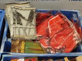 many items in a blue box on the table