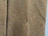 an image of a sweater hanging on a hanger