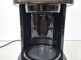 a coffee maker that is sitting on a table