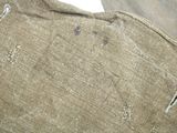 a close up of a piece of fabric with holes