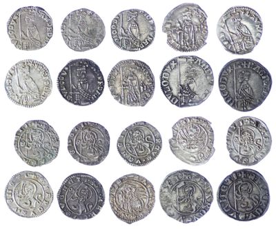 an image of a collection of silver coins on a white background