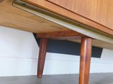 an image of a wooden cabinet with a drawer underneath it