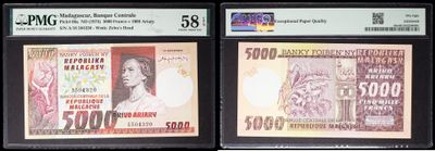 three different types of currency are on display in a display case