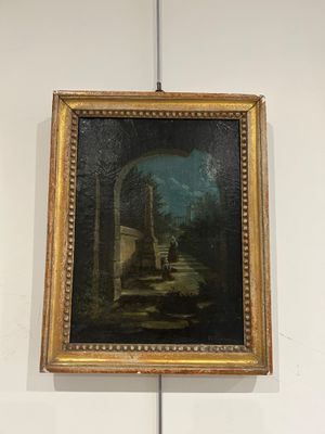 une peinture sur le mur d'une pièce où est accrochée une autre peinture