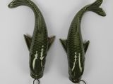 pair of green ceramic koi fish wall hangings