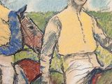 two men that are riding horses in the grass