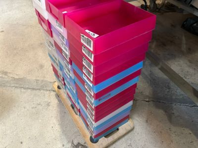 a lot of boxes stacked on top of each other on a pallet