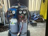 an image of a proprigerator that is on a cart