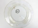 a white plate with a black and white design on it