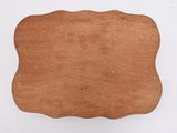 an old wooden sign hanging on a white wall