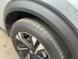 a close up of a car tire on the street
