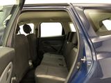 a blue car with the door open and the passenger seat down