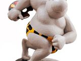 figurine of a cat in a bathing suit holding a remote control