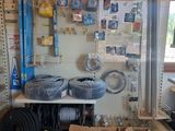 a room with a lot of tools and supplies on the wall