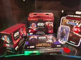 several star wars action figures are on display in a display case