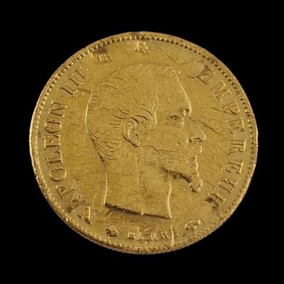 an image of a gold coin with a woman ' s face on it