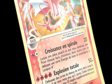 La carte Pokémon présente un motif rouge et jaune.