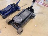 two jacks that are sitting on the floor next to each other