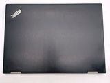 a black laptop that is sitting on a white table