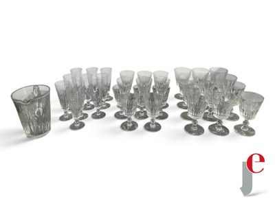 a lot of glasses that are sitting on the table