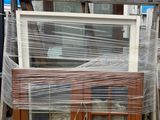 many different types of windows and doors in the yard