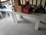 a table that has a bunch of boxes on top of it