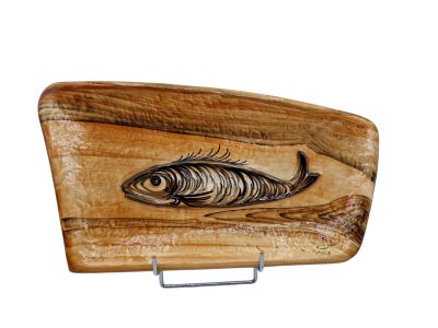 a wooden tray with a fish on it