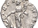 a silver coin with an image of a woman holding a child