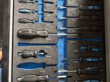 a lot of tools that are in a metal case