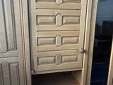 an image of a cabinet made out of wood