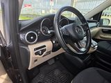 the interior of a car with a steering wheel, dashboard and dashboard controls
