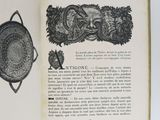 an open book with a picture of a dragon on it