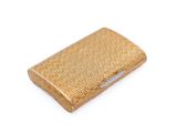 an image of a gold cigarette case sitting on a white surface