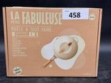a cardboard box with a picture of a bowl and a spoon in it