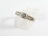 a picture of a diamond ring on a white background